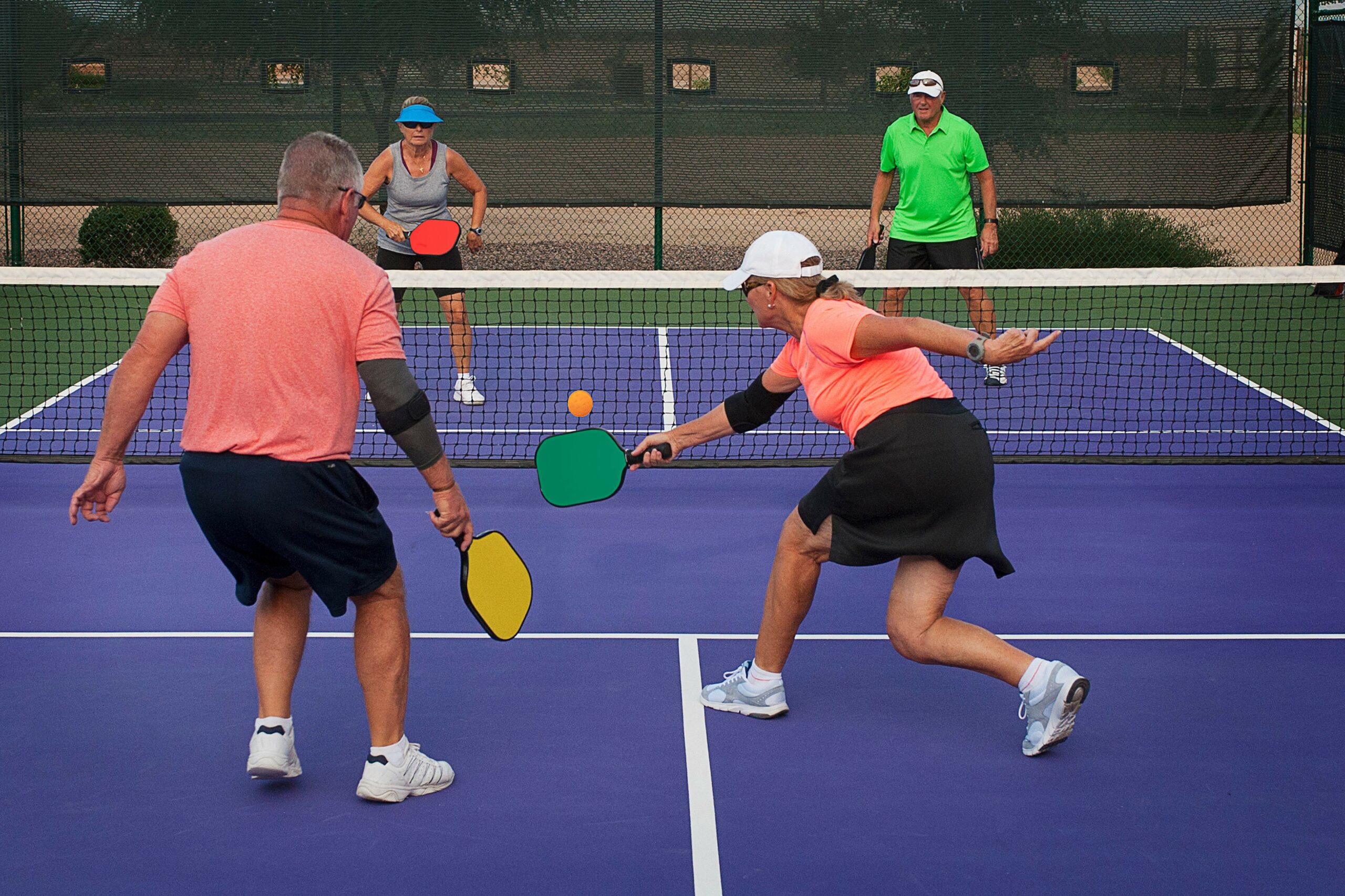 Older Couples Playing Pickleball After Knee Treatment